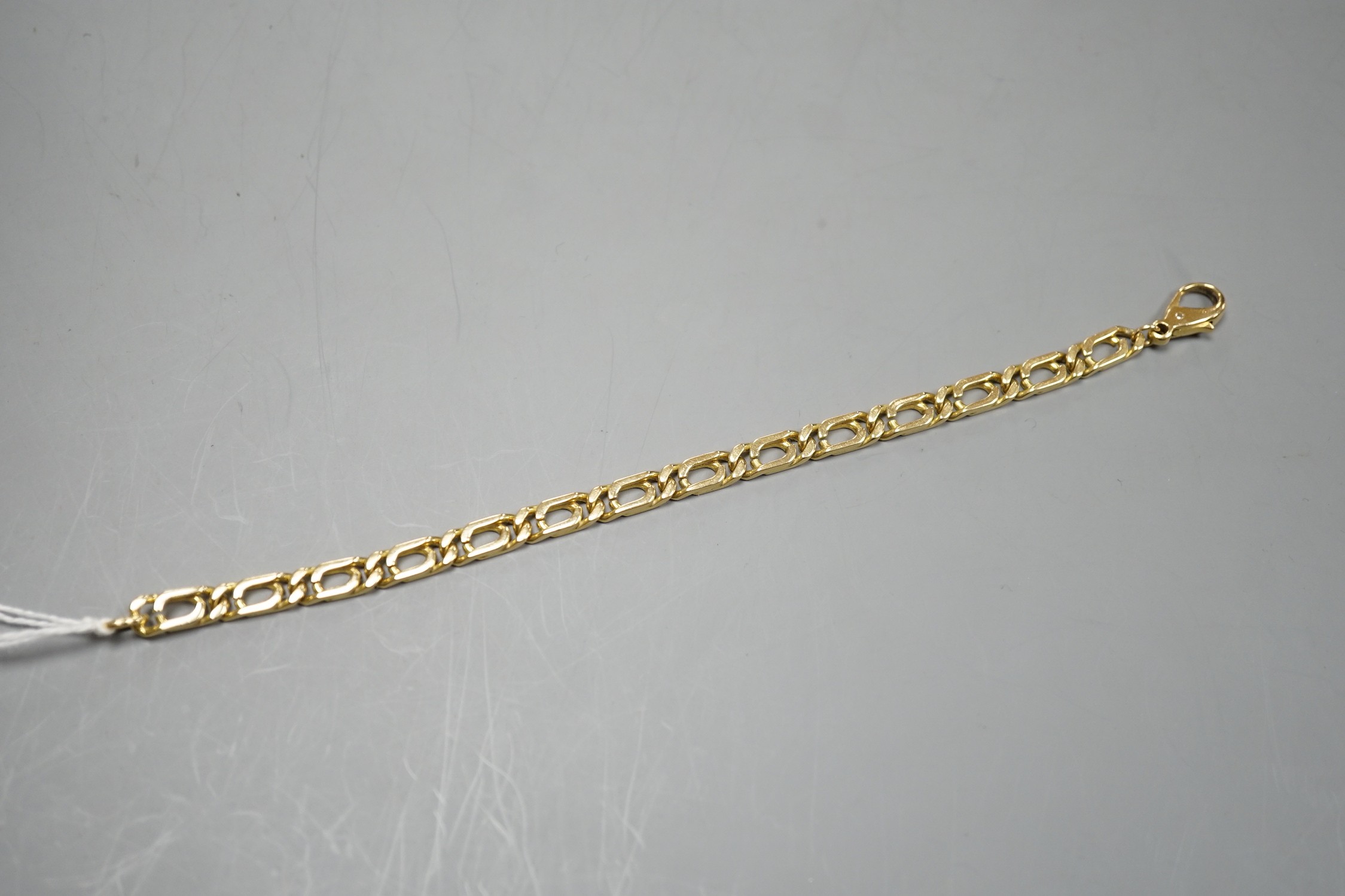 A modern 750 yellow metal rectangular link bracelet, 18cm, 18 grams.